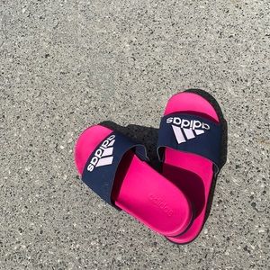 Blue and pink adidas slides